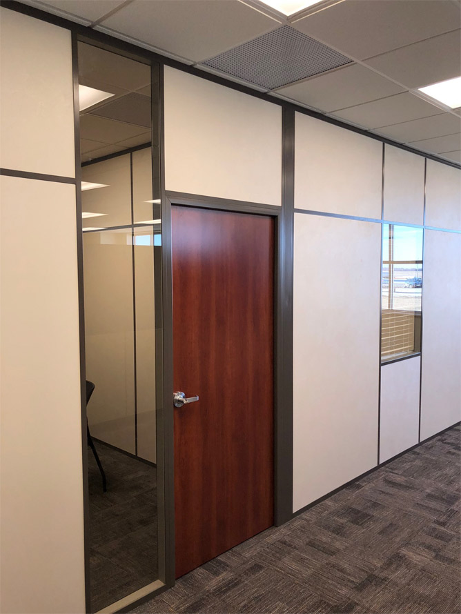 Demountable wall office with wood door - Brownstone frame color paired with clay stud bead