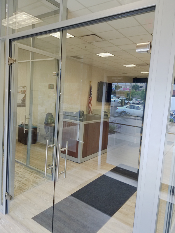 All glass double swing doors - Credit Union Installation