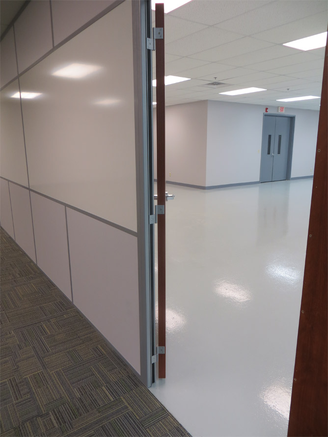 Flex integrated whiteboard wall and swing door hinge profile