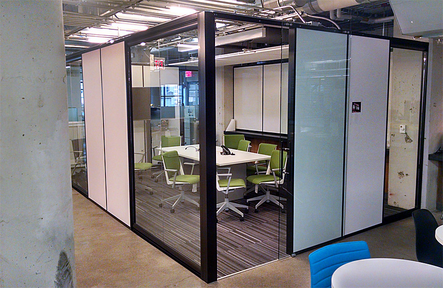 Flex Series freestanding solid office walls integrated with View glass sidelights