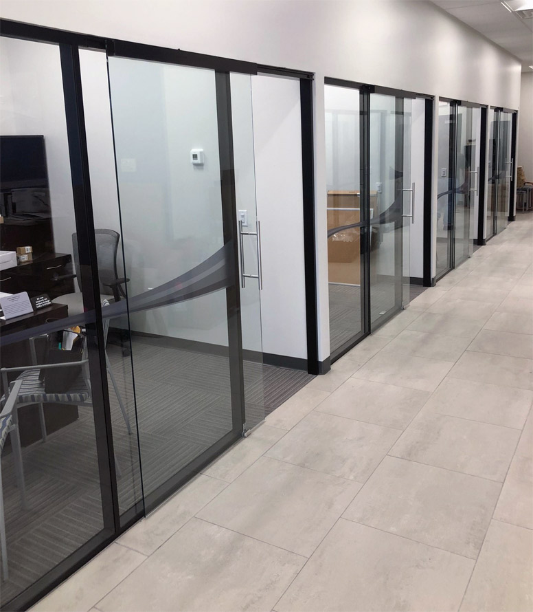 Flex series glass offices and black colormatch extrusions installation