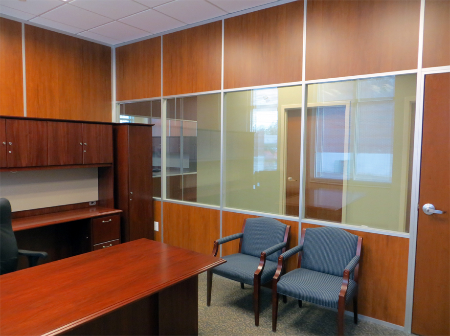 Solid laminate wood and glass panel Communication Center office