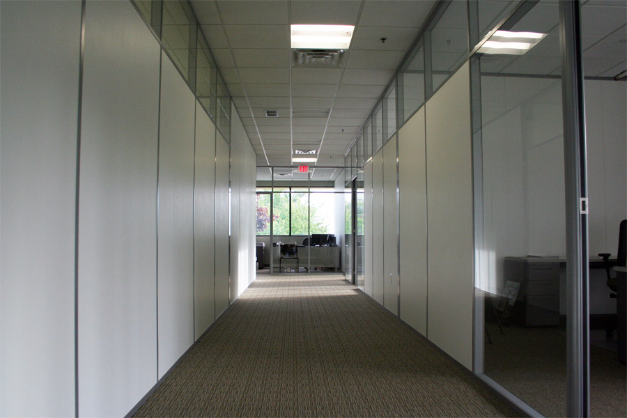 Wrapped gypsum office walls with clerestory