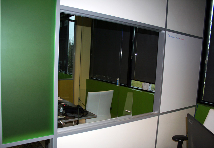 Glass sliding teller window at NxtWall Corporate Offices