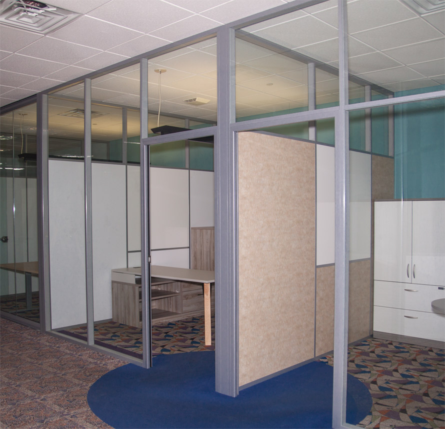Glass offices with whiteboards solid panel demising walls