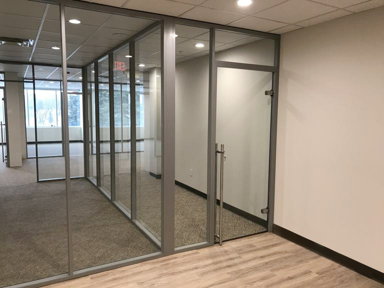 Glass walls with locking sliding glass door financial sector installation