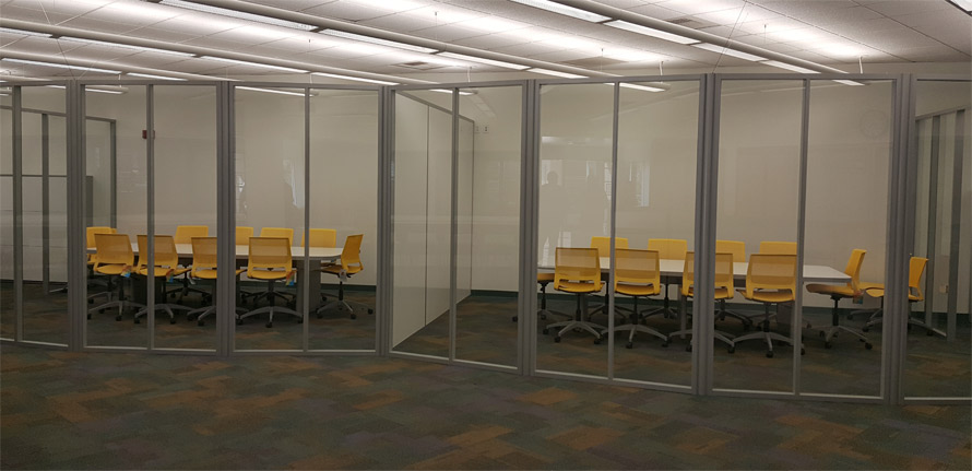Higher Education freestanding curved glass wall installation - NxtWall
