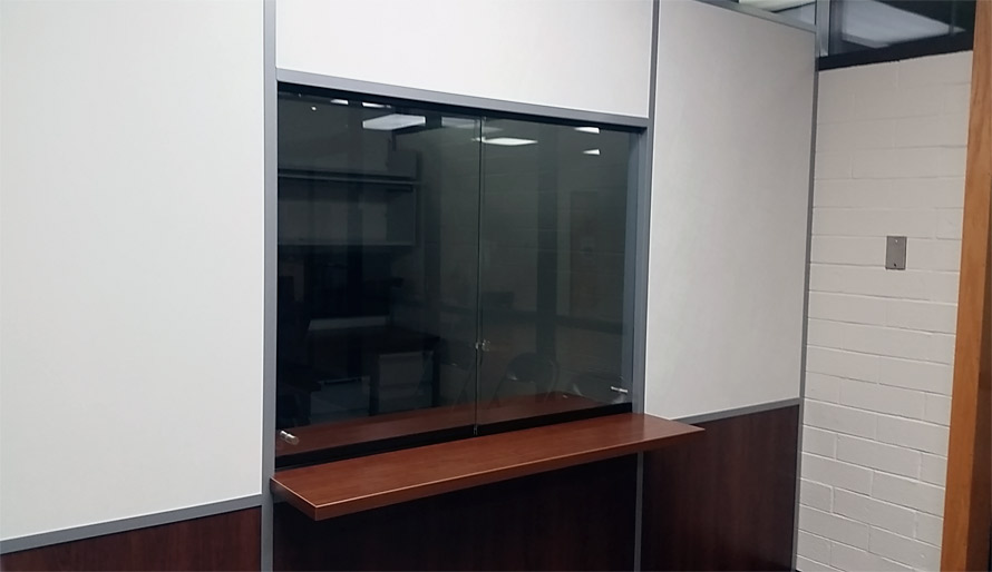 Sliding glass teller window with mounted transaction top