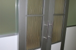 Double sliding barn doors with aluminum frame