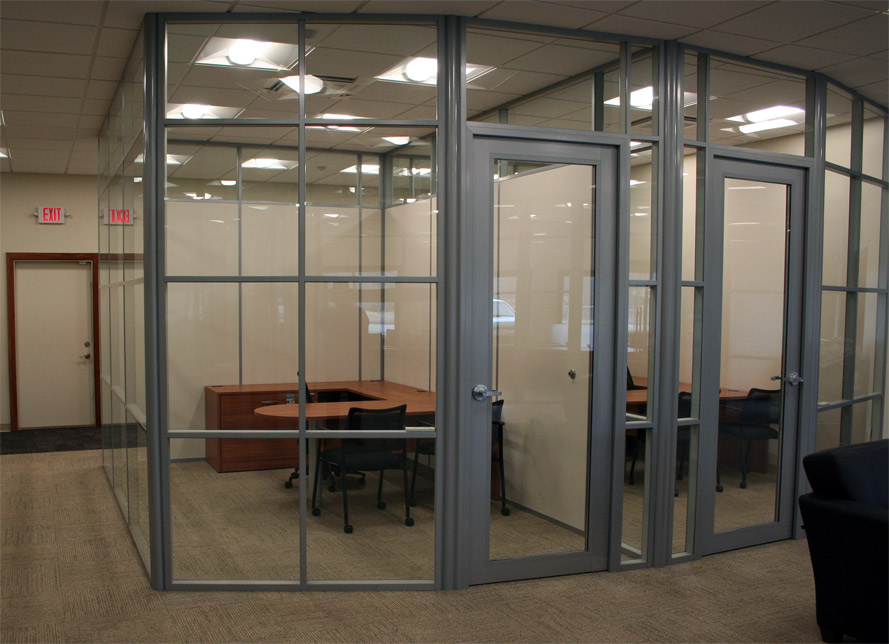 Glass wall systems with radius aluminum corners