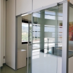 Demountable wall office with locking sliding glass door