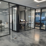 Demountable wall offices with glass fronts and fabric side walls
