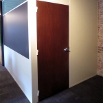 Flex series office with white trim and solid mahogany door