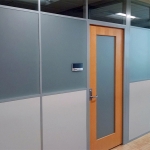 Wood framed swing doors with frosted glass inserts - Flex Series