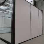 Solid Vinyl-wrapped Gypsum walls with Freestanding View Series Glass Front