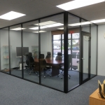 Black aluminum and glass conference room