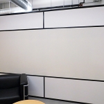Black wall trim freestanding office with whiteboard wall