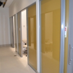 Flex system office shadow box glass walls
