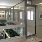 Glass wall with sliding door
