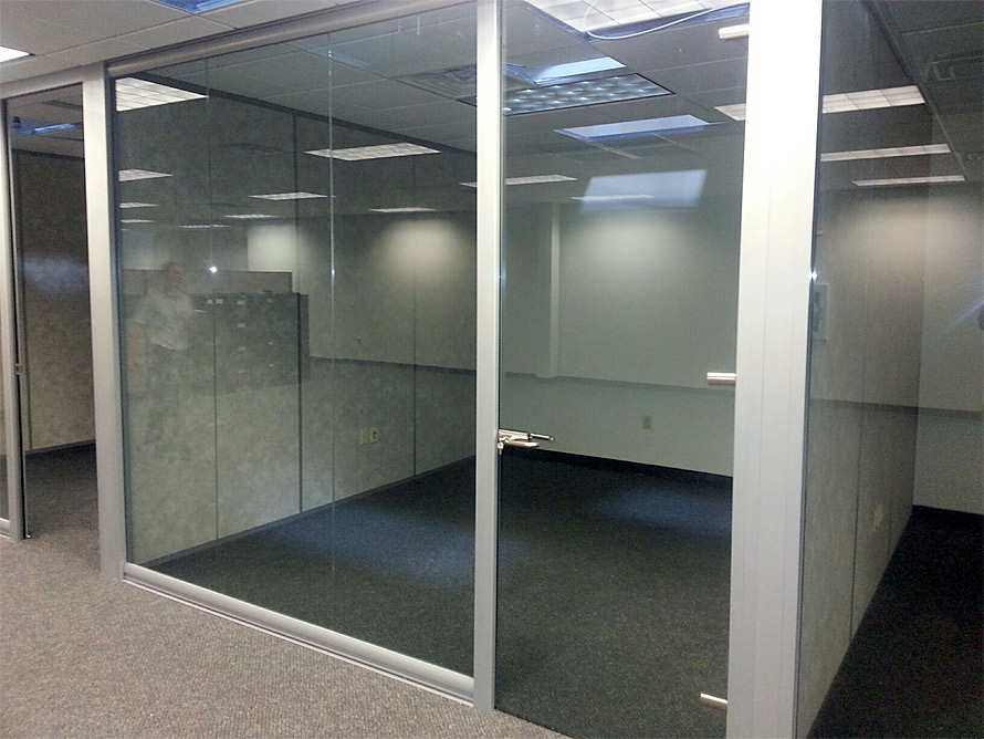 Glass office with frameless glass door