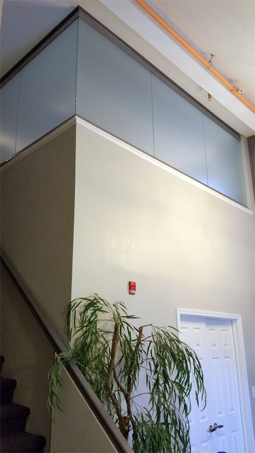 Glass riser walls with open corner - NxtWall View Series