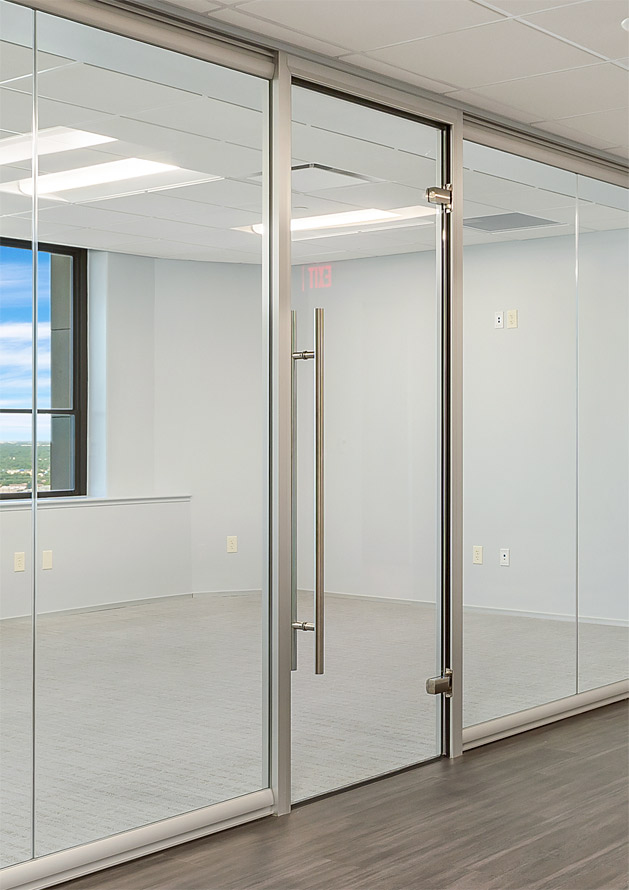 Modern glass walls with frameless swing glass door
