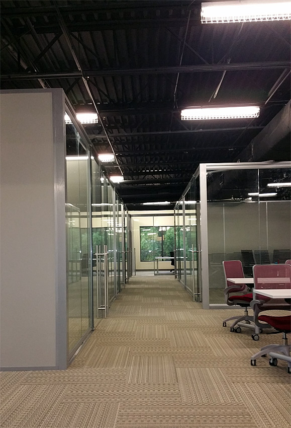 Freestanding View series glass office fronts with sliding doors