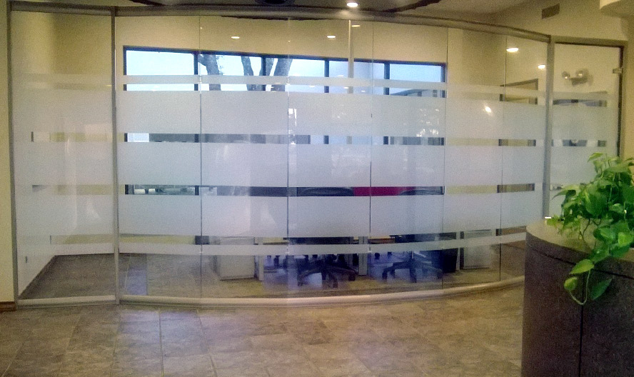 Full height glass conference room with curved wall and glass swing door - View series