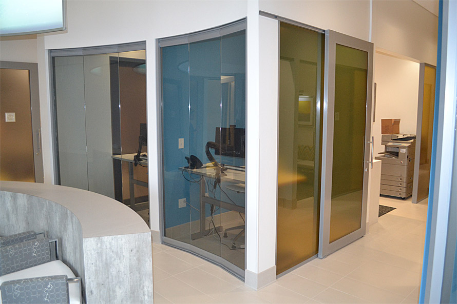 Glass wall system with sliding c-rail door