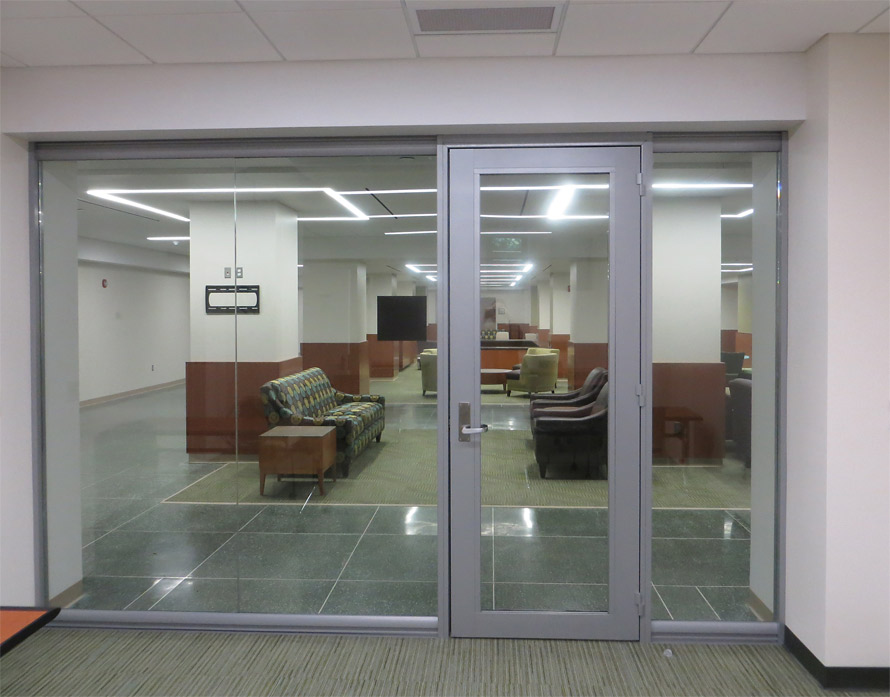 Seamless glass front with aluminum frame glass door