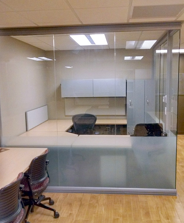 Seamless glass office with privacy film at bottom of glass panels