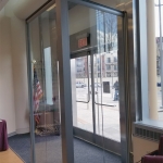 Freestanding glass vestibule with View Series - Credit Union glass wall installation