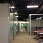 Freestanding View series glass office fronts with sliding doors