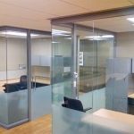 Full height open corner glass University offices