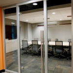 glass door with locking door pull meeting room