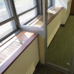 View series center mounted glass wall and window sill integration