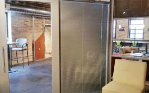 showroom-enclosed-blinds-in-office-glass-wall-ntxtwall