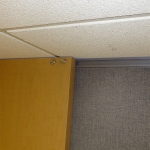 Rollers and c-rail on solid sliding door #0371