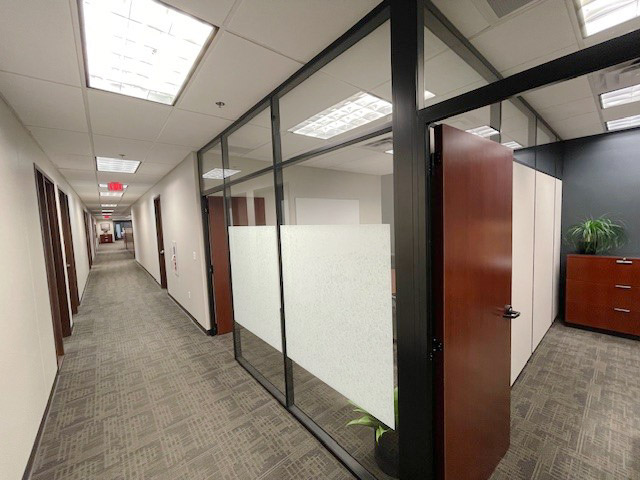 Flex series black framed glass office fronts with solid sidewall and glass clerestory #1671