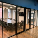 Flex Series Glass Conference Room with Black Aluminum Frame Finish and Locking Double Sliding Aluminum Frame Doors #1803