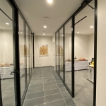 Flex Series Glass Walls Black Frame Finish and Self-Close Swing Doors #1816