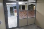 Offices with aluminum framed glass insert swing doors #0343