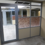 Offices with aluminum framed glass insert swing doors #0343