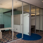 Glass Offices with Powered Solid Sidewalls