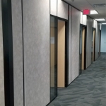 Flex Series floor-to-ceiling walls with solid core laminate doors #1546
