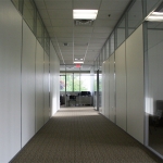 Wrapped gypsum office walls with clerestory