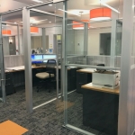 Private Offices with Frameless Glass Sliding Doors