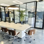 Full height sliding black aluminum framed door conference room - Flex Series
