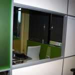 Glass sliding teller window at NxtWall Corporate Offices