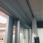Patient room demountable walls with c-rail privacy curtains